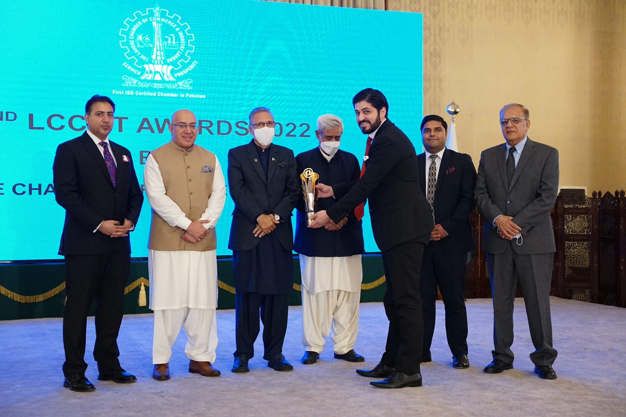Shehryar T. Ali receiving the Best Software House Award at the masked presidential presentation on 9 March 2022.